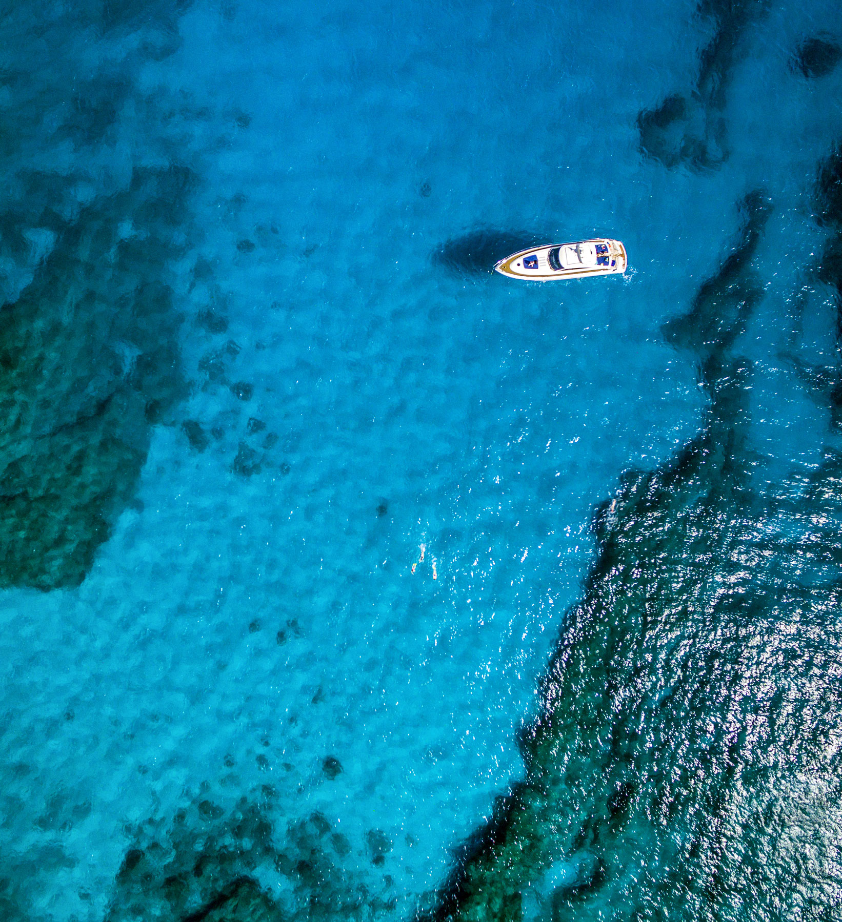 Motorboat on turquoise water